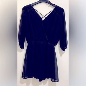 Juniors Black short romper with long sleeves by Rags to swishes size large